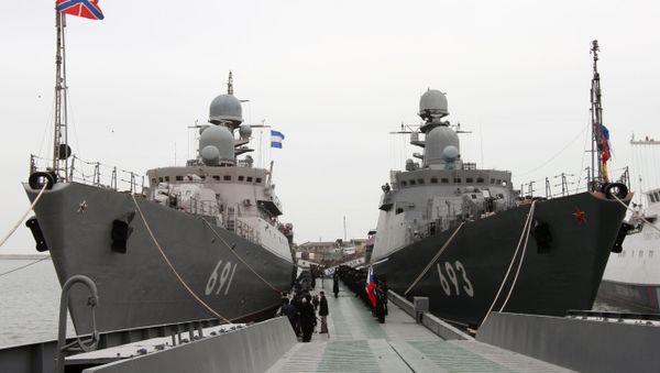 The latest missile ship project 11661K Dagestan (right), which becomes part of the Caspian Flotilla, in Makhachkala seaport. Left: the rocket ship Tatarstan. The Dagestan is the first ship of the Russian Navy armed with a new universal missile complex Caliber-NK, capable of applying several types of high-precision missiles manufactured using stealth technology. - Sputnik International