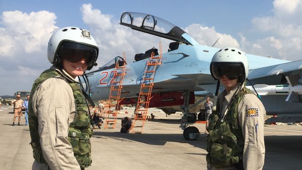 Russian pilots prepared to board the SU-30 attack plane to take off from the Hmeimim aerodrome in Syria. Russian pilots prepared to board the SU-30 attack plane to take off from the Hmeimim aerodrome in Syria. - Sputnik International