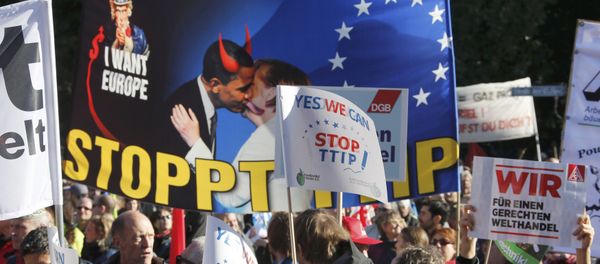Consumer rights activists take part in a march to protest against the Transatlantic Trade and Investment Partnership (TTIP), mass husbandry and genetic engineering, in Berlin, Germany - Sputnik International