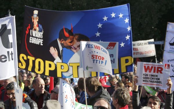 Consumer rights activists take part in a march to protest against the Transatlantic Trade and Investment Partnership (TTIP), mass husbandry and genetic engineering, in Berlin, Germany Consumer rights activists take part in a march to protest against the Transatlantic Trade and Investment Partnership (TTIP), mass husbandry and genetic engineering, in Berlin, Germany - Sputnik International