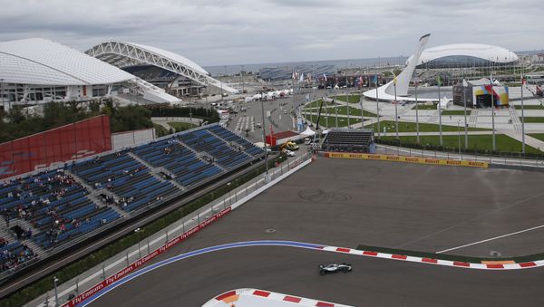 Mercedes driver Lewis Hamilton of Britain steers his car during the first free practice at the 'Sochi Autodrom' Formula One track , in Sochi, Russia, Friday, Oct. 9, 2015 - Sputnik International