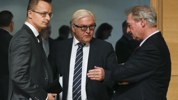 (LtoR) Hungary's Foreign Minister Janos Martonyi talks with German Foreign Minister Frank-Walter Steinmeier and Luxembourg's Foreign Minister Jean Asselborn during a EU Foreign Affairs Council meeting in Luxembourg on October 12, 2015. AFP PHOTO / JOHN THYS (LtoR) Hungary's Foreign Minister Janos Martonyi talks with German Foreign Minister Frank-Walter Steinmeier and Luxembourg's Foreign Minister Jean Asselborn during a EU Foreign Affairs Council meeting in Luxembourg on October 12, 2015. AFP PHOTO / JOHN THYS - Sputnik International