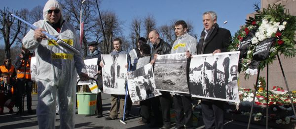 Antifascists hold an action protesting public events held on the occasion of the day of memory of the Latvian Legion Waffen-SS at the Freedom Monument in Riga Antifascists hold an action protesting public events held on the occasion of the day of memory of the Latvian Legion Waffen-SS at the Freedom Monument in Riga - Sputnik International