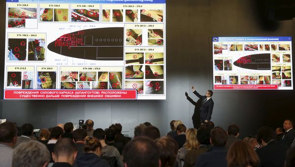 Journalists attend a news conference, organized by officials of Russian missile manufacturer Almaz-Antey and dedicated to the results of its investigation into Malaysia Airlines flight MH17 crash in eastern Ukraine, in Moscow, Russia, October 13, 2015 - Sputnik International
