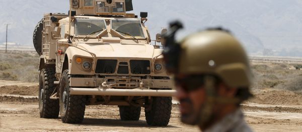 Colonel Abdullah bin Sahyan, who commands the Saudi forces in Yemen's southern port city of Aden, looks as he stands at his base in Aden September 28, 2015 - Sputnik International