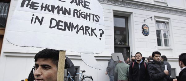 Some thirty Syrian refugees hold banners in Copenhagen, Denmark Some thirty Syrian refugees hold banners in Copenhagen, Denmark - Sputnik International