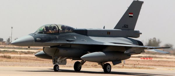 One of the two recently delivered F-16 fighter jets from the US is seen on the tarmac at Iraq's Balad air base in the Salaheddin province, north of the capital Baghdad, on July 20, 2015 One of the two recently delivered F-16 fighter jets from the US is seen on the tarmac at Iraq's Balad air base in the Salaheddin province, north of the capital Baghdad, on July 20, 2015 - Sputnik International