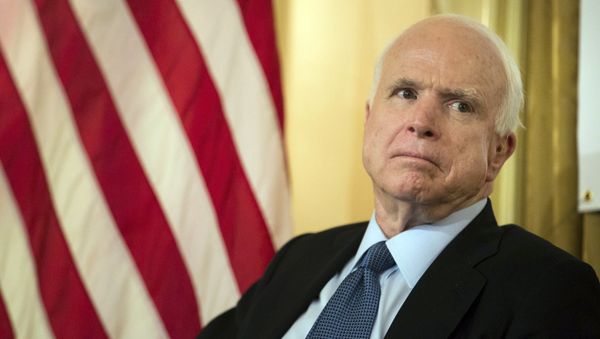 Sen. John McCain, R-Ariz., listens as Republican presidential candidate Lindsey Graham speaks defending McCain's military record during a town hall meeting at the 3 West Club to launch Graham's “No Nukes for Iran” tour Monday, July 20, 2015, in New York - Sputnik International