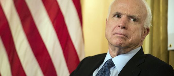 Sen. John McCain, R-Ariz., listens as Republican presidential candidate Lindsey Graham speaks defending McCain's military record during a town hall meeting at the 3 West Club to launch Graham's “No Nukes for Iran” tour Monday, July 20, 2015, in New York Sen. John McCain, R-Ariz., listens as Republican presidential candidate Lindsey Graham speaks defending McCain's military record during a town hall meeting at the 3 West Club to launch Graham's “No Nukes for Iran” tour Monday, July 20, 2015, in New York - Sputnik International