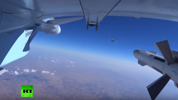 The Russian Defense Ministry released footage on Wednesday of bombs being dropped on targets in Syria. - Sputnik International