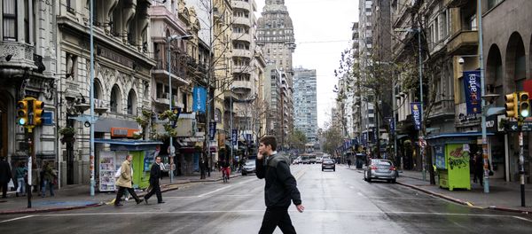 A man crosses the capital's main avenue, during a full-day general strike in Montevideo, Uruguay, Thursday, Aug. 6, 2015 A man crosses the capital's main avenue, during a full-day general strike in Montevideo, Uruguay, Thursday, Aug. 6, 2015 - Sputnik International