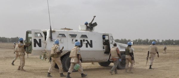 UN peacekeepers patrol on May 12, 2015 in Timbuktu, where ninet Malian soldiers were killed by the rebel Coordination of Azawad Movements (CMA) between Timbuktu and Goundam on May 11 UN peacekeepers patrol on May 12, 2015 in Timbuktu, where ninet Malian soldiers were killed by the rebel Coordination of Azawad Movements (CMA) between Timbuktu and Goundam on May 11 - Sputnik International