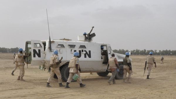 UN peacekeepers patrol on May 12, 2015 in Timbuktu, where ninet Malian soldiers were killed by the rebel Coordination of Azawad Movements (CMA) between Timbuktu and Goundam on May 11 UN peacekeepers patrol on May 12, 2015 in Timbuktu, where ninet Malian soldiers were killed by the rebel Coordination of Azawad Movements (CMA) between Timbuktu and Goundam on May 11 - Sputnik International