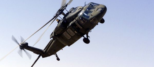A picture taken 30 October 2000 shows an UH-60 Blackhawk helicopter flying near the Prince Sultan Air Base, Saudi Arabia. A picture taken 30 October 2000 shows an UH-60 Blackhawk helicopter flying near the Prince Sultan Air Base, Saudi Arabia. - Sputnik International