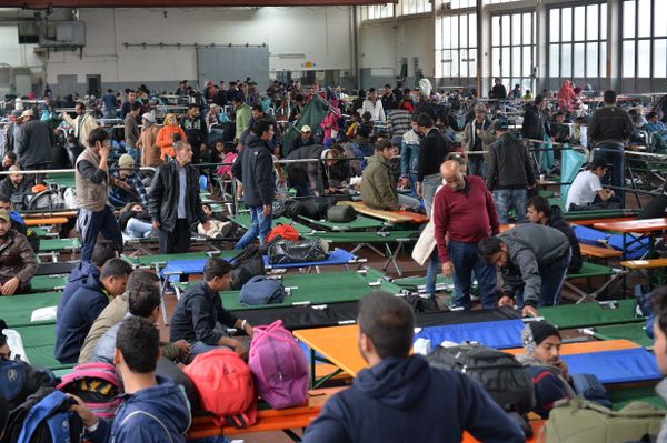 Refugees wait in a crowded migrant registration center in Passau, southern Germany, Thursday, Oct. 8, 2015 Refugees wait in a crowded migrant registration center in Passau, southern Germany, Thursday, Oct. 8, 2015 - Sputnik International
