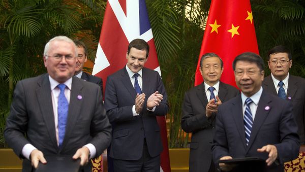 Britain's Chancellor of the Exchequer George Osborne, center left, and Chinese Vice President Ma Kai, center right, applause as they witness a signing ceremony of the 7th China-UK strategic economic dialogue Roundtable on Public-Private Partnerships at Diaoyutai State Guesthouse Monday, Sept. 21, 2015 in Beijing. Britain's Chancellor of the Exchequer George Osborne, center left, and Chinese Vice President Ma Kai, center right, applause as they witness a signing ceremony of the 7th China-UK strategic economic dialogue Roundtable on Public-Private Partnerships at Diaoyutai State Guesthouse Monday, Sept. 21, 2015 in Beijing. - Sputnik International