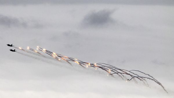 Su-24 fighter jets perform a combat mission Su-24 fighter jets perform a combat mission - Sputnik International