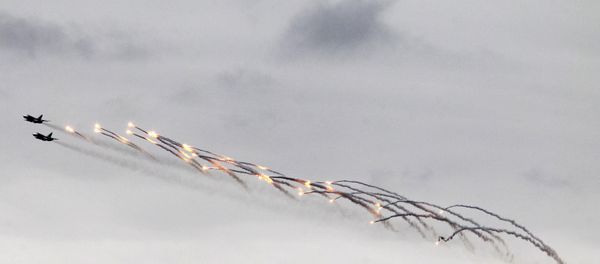 Su-24 fighter jets perform a combat mission Su-24 fighter jets perform a combat mission - Sputnik International