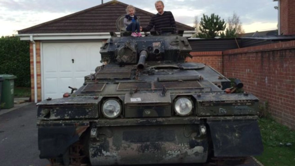 After purchasing a seven-ton tank on an online auction, a British man was forced to move out of his apartment as he couldn’t find enough space to park his armored vehicle, ITV News reported. After purchasing a seven-ton tank on an online auction, a British man was forced to move out of his apartment as he couldn’t find enough space to park his armored vehicle, ITV News reported. - Sputnik International