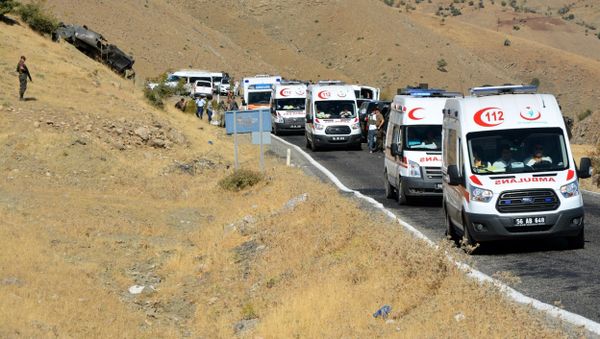 Turkish soldiers, security members and ambulances at the explosian site after soldiers were killed by a roadside bomb detonated by Kurdish rebels. Turkish soldiers, security members and ambulances at the explosian site after soldiers were killed by a roadside bomb detonated by Kurdish rebels. - Sputnik International