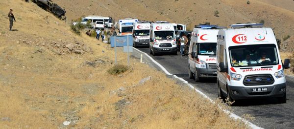 Turkish soldiers, security members and ambulances at the explosian site after soldiers were killed by a roadside bomb detonated by Kurdish rebels. - Sputnik International