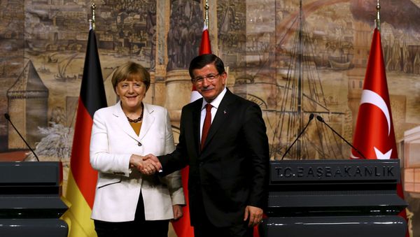 German Chancellor Angela Merkel meets Turkish Prime Minister Ahmet Davutoglu (R) in Istanbul, Turkey German Chancellor Angela Merkel meets Turkish Prime Minister Ahmet Davutoglu (R) in Istanbul, Turkey - Sputnik International