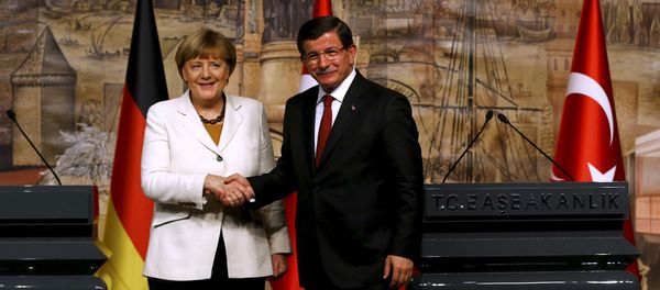 German Chancellor Angela Merkel meets Turkish Prime Minister Ahmet Davutoglu (R) in Istanbul, Turkey German Chancellor Angela Merkel meets Turkish Prime Minister Ahmet Davutoglu (R) in Istanbul, Turkey - Sputnik International