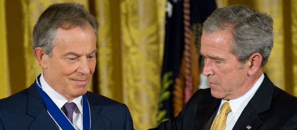 US President George W. Bush presents the Presidential Medal of Freedom to former British Prime Minister Tony Blair (L) in the East Room of the White House in Washington. (File) US President George W. Bush presents the Presidential Medal of Freedom to former British Prime Minister Tony Blair (L) in the East Room of the White House in Washington. (File) - Sputnik International