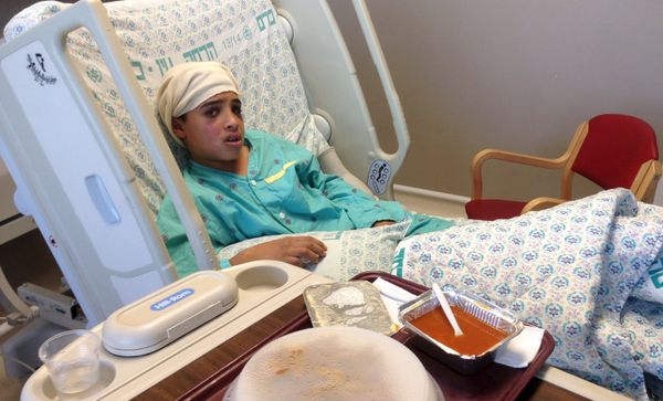 Ahmed Manasra, a 13-year-old Palestinian who allegedly stabbed two Jewish Israelis, sits in his hospital bed at a hospital in Jerusalem. Ahmed Manasra, a 13-year-old Palestinian who allegedly stabbed two Jewish Israelis, sits in his hospital bed at a hospital in Jerusalem. - Sputnik International
