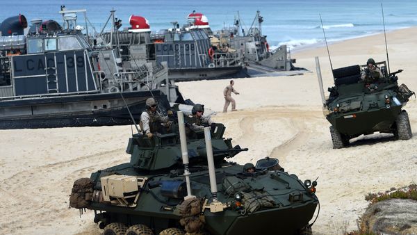 US marines disembark their armoured vehicles from the overcrafts deploid by the USS Arlington amphibious transport dock during the NATO's Trident Juncture exercise at Pinheiro da Cruz beach, south of Lisbon, near Grandola on October 20, 2015 - Sputnik International