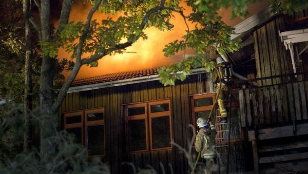 Firefighters battle a fire at Furulid School in Kungsbacka, south of Goteborg, Sweden, October 18, 2015 (archive photo, used for illustration purpose) Firefighters battle a fire at Furulid School in Kungsbacka, south of Goteborg, Sweden, October 18, 2015 (archive photo, used for illustration purpose) - Sputnik International