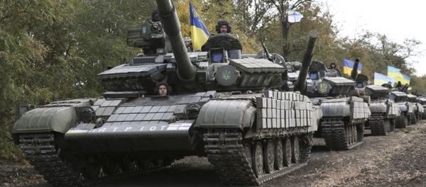 Ukrainian tanks move near Mariupol, Donetsk region, eastern Ukraine, Wednesday, Oct. 21, 2015 Ukrainian tanks move near Mariupol, Donetsk region, eastern Ukraine, Wednesday, Oct. 21, 2015 - Sputnik International