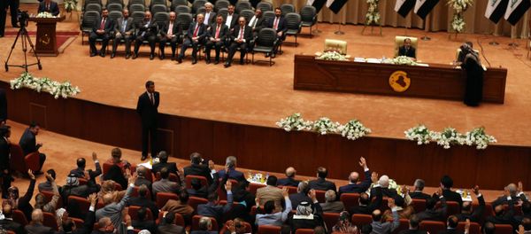 Iraqi lawmakers raise their hands to approve a new government in Baghdad, Iraq, Monday, Sept. 8, 2014 Iraqi lawmakers raise their hands to approve a new government in Baghdad, Iraq, Monday, Sept. 8, 2014 - Sputnik International