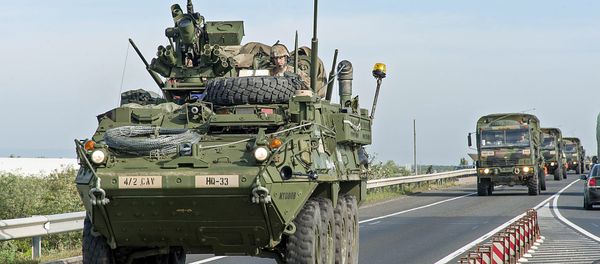 US military vehicle dirves in a convoy on the M15 motorway near Hegyeshalom, 168 km west of Budapest, Hungary, Wednesday, Sept. 16, 2015, a day prior to the NATO Brave Warrior 2015 international military exercise US military vehicle dirves in a convoy on the M15 motorway near Hegyeshalom, 168 km west of Budapest, Hungary, Wednesday, Sept. 16, 2015, a day prior to the NATO Brave Warrior 2015 international military exercise - Sputnik International