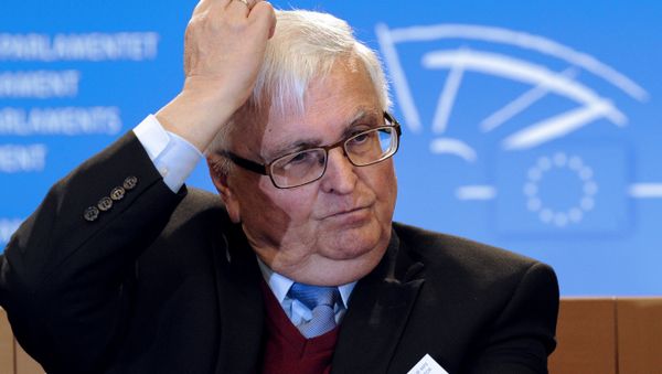 Theo Zwanziger, member of the FIFA Executive Committee, takes part in a press conference after a meeting with the Chair of Subcommittee on Human Rights on the situation of migrant workers in Qatar at the EU Headquarters in Brussels on February 13, 2014 - Sputnik International
