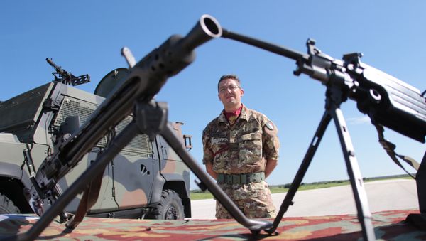 A soldier attends the opening ceremony of NATO’s large scale exercise Trident Juncture 2015 at the Italian Air Force Base in Trapani, Sicily. - Sputnik International