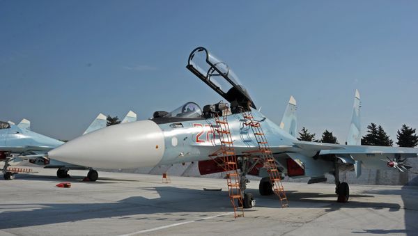 Russian aircraft at Hmeymim Air Base in Syria - Sputnik International