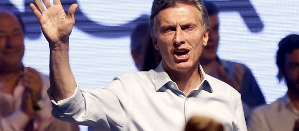 Mauricio Macri, presidential candidate of Cambiemos (Let's Change) coalition waves to his supporters after election in Buenos Aires, Argentina, October 25, 2015. Mauricio Macri, presidential candidate of Cambiemos (Let's Change) coalition waves to his supporters after election in Buenos Aires, Argentina, October 25, 2015. - Sputnik International