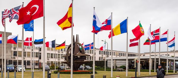 NATO country flags wave outside NATO headquarters in Brussels - Sputnik International