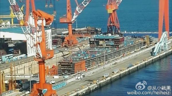 This hull under construction at Dalian Shipyard could be China's first indigenous aircraft carrier. This hull under construction at Dalian Shipyard could be China's first indigenous aircraft carrier. - Sputnik International