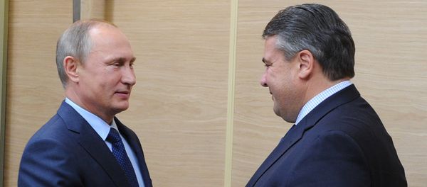Russian President Vladimir Putin, left, and German Vice Chancellor and Minister for Economic Affairs and Energy Sigmar Gabriel during their meeting in Novo-Ogaryovo - Sputnik International