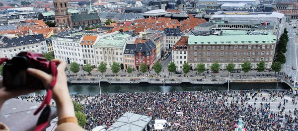 A photographer takes a photo of some 30,000 people who joined a rally in Copenhagen on September 12, 2015 in favour of taking in thousands of refugees seeking shelter in Europe, police said A photographer takes a photo of some 30,000 people who joined a rally in Copenhagen on September 12, 2015 in favour of taking in thousands of refugees seeking shelter in Europe, police said - Sputnik International