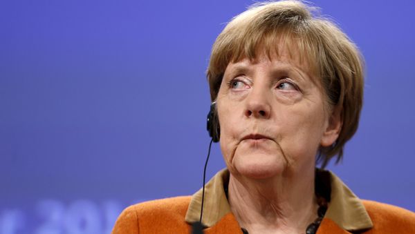 Germany's Chancellor Angela Merkel addresses a news conference after a meeting over the Balkan refugee crisis with leaders from central and eastern Europe at the EU Commission headquarters in Brussels, Belgium, October 26, 2015 Germany's Chancellor Angela Merkel addresses a news conference after a meeting over the Balkan refugee crisis with leaders from central and eastern Europe at the EU Commission headquarters in Brussels, Belgium, October 26, 2015 - Sputnik International