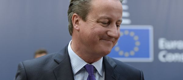 British Prime Minister David Cameron arrives to take part in a European Union (EU) summit dominated by the migration crisis at the European Council in Brussels, on October 15, 2015 British Prime Minister David Cameron arrives to take part in a European Union (EU) summit dominated by the migration crisis at the European Council in Brussels, on October 15, 2015 - Sputnik International