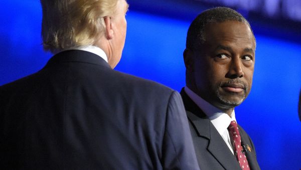Ben Carson watches as Donald Trump takes the stage during the CNBC Republican presidential debate at the University of Colorado. Ben Carson watches as Donald Trump takes the stage during the CNBC Republican presidential debate at the University of Colorado. - Sputnik International