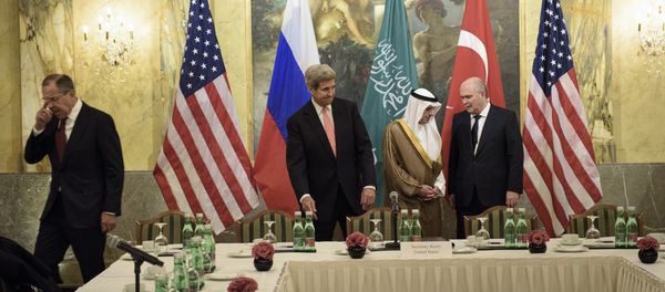 (From left) Russian Foreign Minister Sergei Lavrov, US Secretary of State John Kerry, Saudi Foreign Minister Adel al-Jubeir and Turkish Foreign Minister Feridun Sinirlioglu take their seats before a meeting at the Hotel Imperial at Hotel Imperial on October 29, 2015 in Vienna, Austria - Sputnik International
