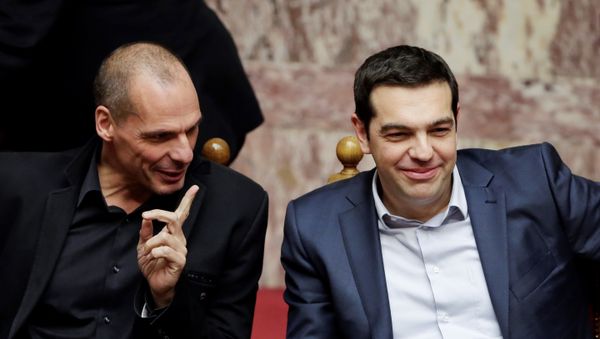 Greece's Prime Minister Alexis Tsipras, right, and Finance Minister Yanis Varoufakis chat during a Presidential vote in Athens, on Wednesday, Feb. 18, 2015. - Sputnik International