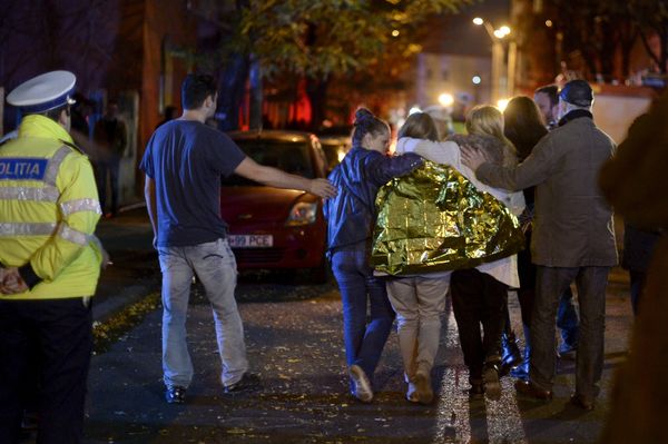 People walk outside a nightclub following an explosion in Bucharest People walk outside a nightclub following an explosion in Bucharest - Sputnik International
