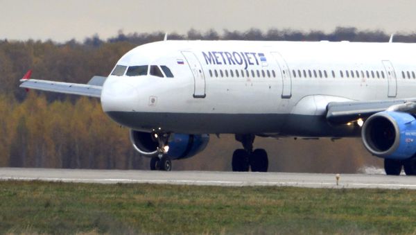 In this photo taken on Tuesday, Oct. 20, 2015, The Russian airline Kogalymavia’s Airbus A321 with a tail number of EI-ETJ on an airstrip of Moscow’s Domodedovo international airport, outside Moscow, Russia - Sputnik International