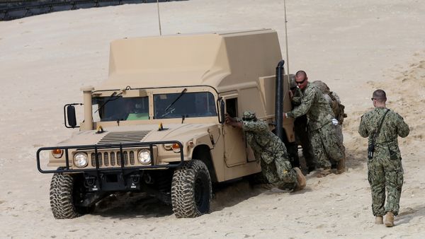 US marines and Portuguese fuzileiros get off a US Navy hovercraft after landing at the beach during the NATO Trident Juncture exercise 2015 at Raposa Media beach in Pinheiro da Cruz, south of Lisbon, Tuesday, Oct. 20, 2015 - Sputnik International